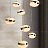 Готовая комбинация подвесных светильников с блестящими плафонами эллиптической формы с зигзагообразным элементом золотого цвета AMADEO MORE фото 2